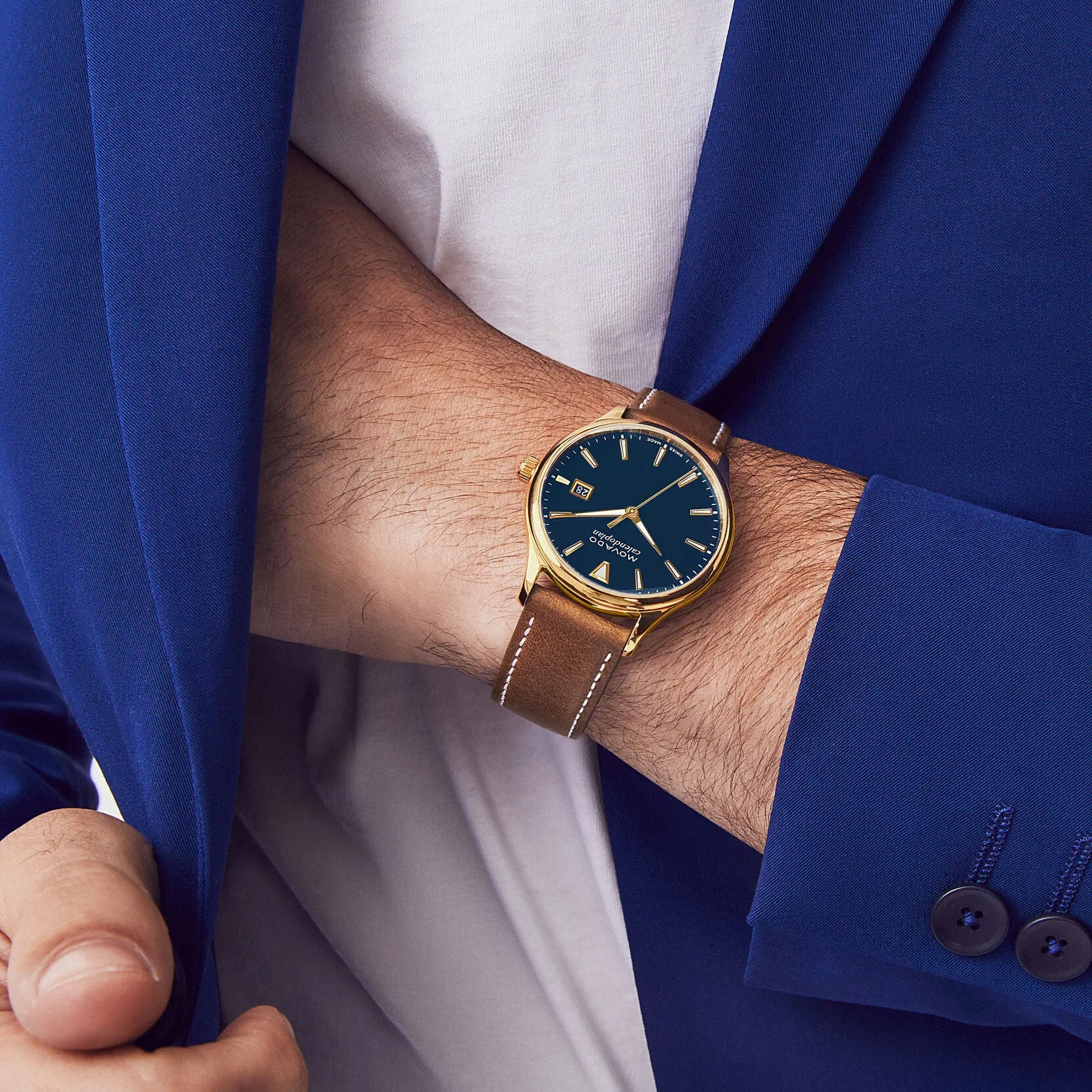 Movado Heritage Series Mens Gold Tone Blue Dial Brown Leather Strap Watch